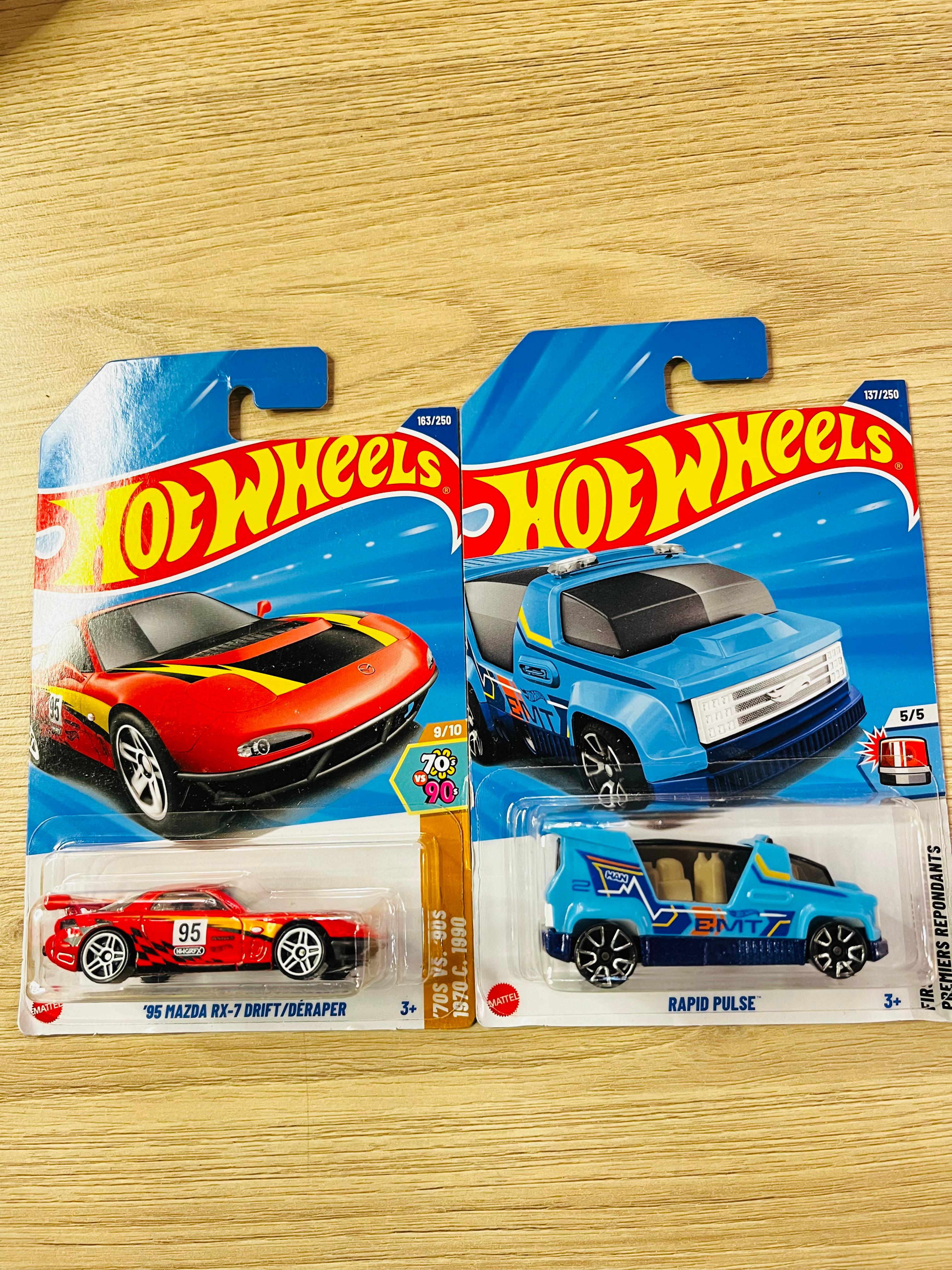 HOTWHEELS BASIC CAR ASSORTMENT N CASE 95 MAZDA RX7 + RAPID PULSE