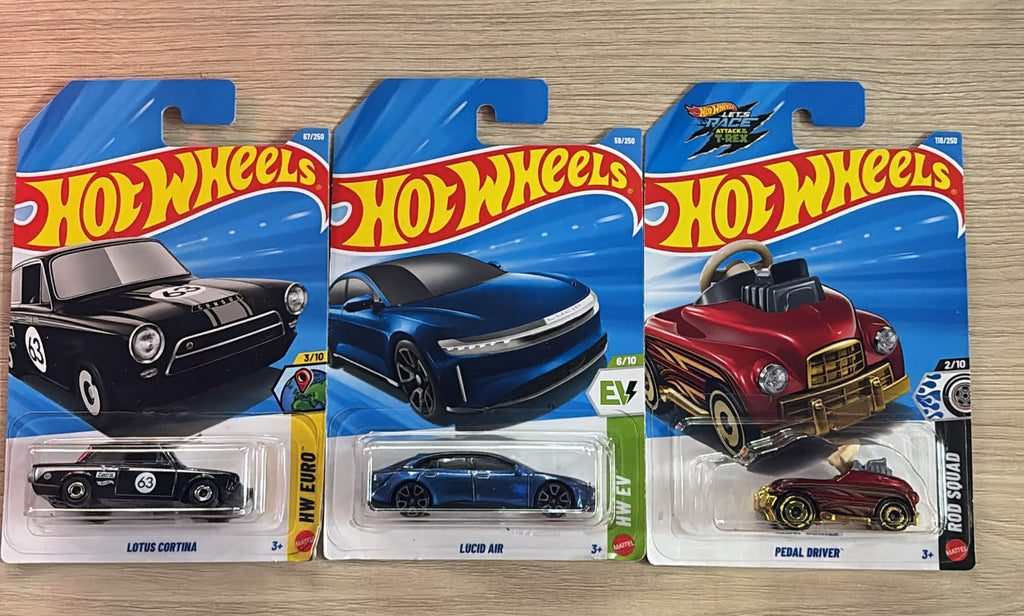 HOTWHEELS BASIC CAR 2026 L CASE MASERATI SHAMAL + LOTUS CORTINA + LUCID AIR + PEDAL DRIVER